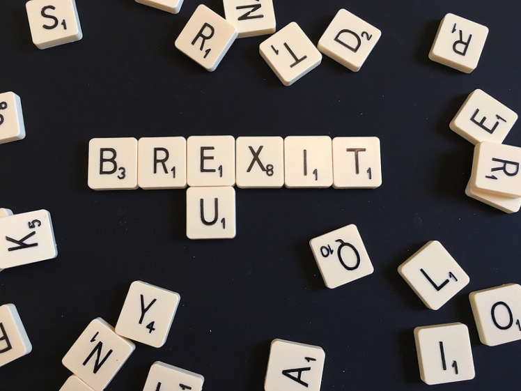 Scrabble tiles forming Brextit and EU